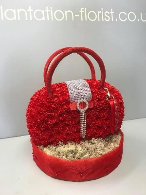 10. Designer handbag